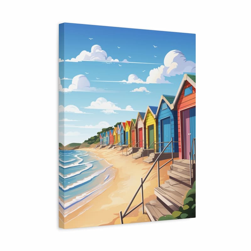 A vertical canvas wall art print depicting a colorful row of beach huts along a sandy beach with blue ocean waves and a bright blue sky with white clouds, shown at a slight angle against a white background.