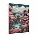 A vertical canvas wall art print featuring a stylized Japanese-inspired landscape with pink cherry blossoms, a red pagoda, mountains, and a waterfall, shown at a slight angle against a white background.