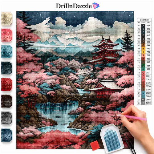 A diamond painting or cross-stitch style scenic artwork showing a Japanese landscape with cherry blossoms, mountains, a river, pagoda, and a hand holding a paint brush. The image includes a color list chart on the right and swatches of available colors on the left, with the brand name DrillnDazzle at the top.