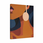 Abstract canvas wall art featuring a stylized close-up portrait with warm orange, tan, dark blue, and brown shapes, plus a large cream oval and pink lips, shown against a white background.