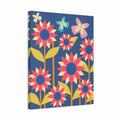 A rectangular wall art print or canvas featuring a retro floral pattern with pink and yellow flowers, blue flower centers, and two butterflies on a dark blue background, shown at a slight angle against a light gray studio backdrop.