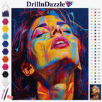 A colorful diamond painting or cross-stitch style portrait of a woman's face, shown with the DrillnDazzle brand name at the top, a color palette strip on the left, a numbered color reference chart on the right, and two small finished preview images at the bottom.