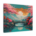 A square canvas wall art print depicting a colorful landscape with pink cherry blossoms, a wooden bridge over teal water, mountains, birds, and a large pale sun in the sky.
