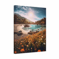 A vertical canvas wall art print depicting a scenic coastal beach with turquoise water, rocky shoreline, mountains, and a bright sun, shown at a slight angle on a white background.