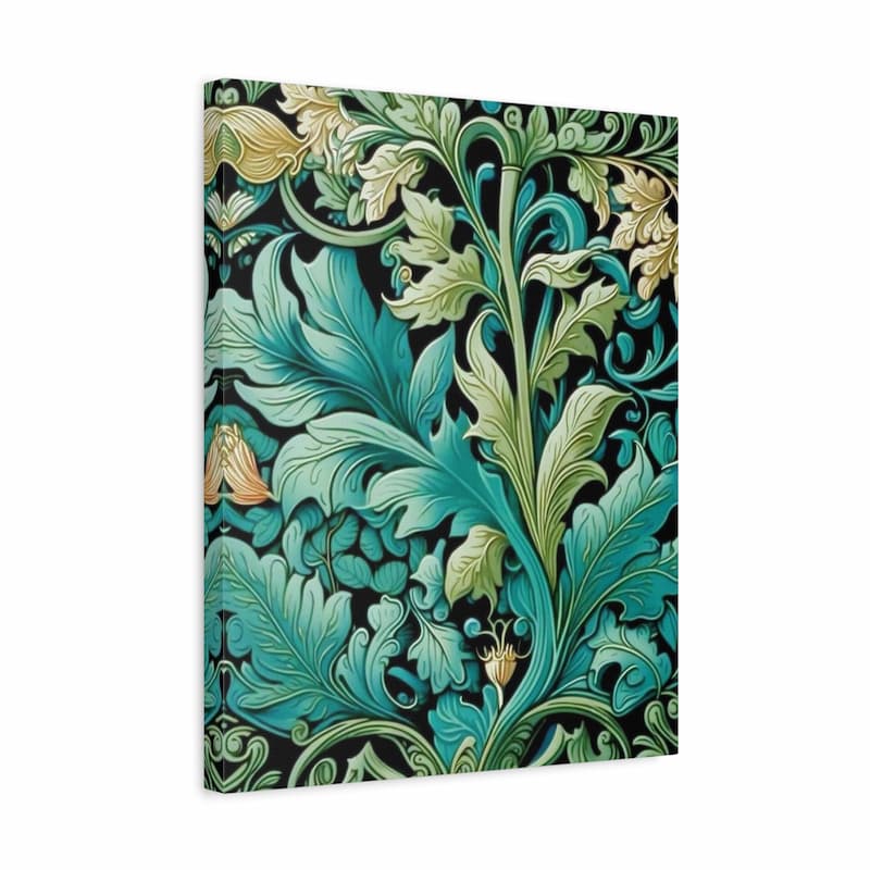 A vertical canvas wall art print featuring a classic William Morris-style botanical pattern with teal, green, and gold leaves and flowers on a black background, shown at a slight angle against a plain white studio backdrop.