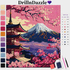 DrillnDazzle cross-stitch kit featuring a Japanese mountain and pagoda design with pink cherry blossoms, shown with a color list, swatches, and tools on a white background.