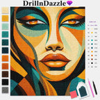 A colorful diamond painting canvas featuring a stylized female face, shown with the DrillnDazzle brand name at the top, a vertical color list on the left, a color list on the right, and small painting tools at the bottom right.