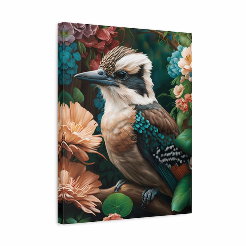 A vertical canvas wall art print featuring a detailed digital painting of a kookaburra perched among colorful flowers and green leaves, shown at a three-quarter angle against a plain white background.