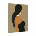 A minimalist canvas wall art print featuring a stylized side profile of a woman with long black hair, warm brown skin, a black strapless top, and white hoop earrings against a taupe background.