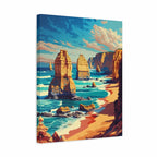 A vertical canvas wall art print depicting a stylized coastal landscape with tall rock formations, turquoise ocean water, sandy beach, and a blue sky with clouds, shown at a slight angle against a white background.