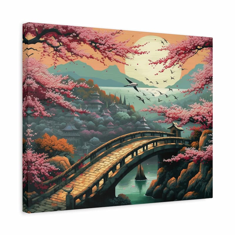 A rectangular canvas wall art print showing a stylized landscape with a stone bridge over water, pink cherry blossoms, mountains, traditional buildings, birds, and a large pale moon in the sky.