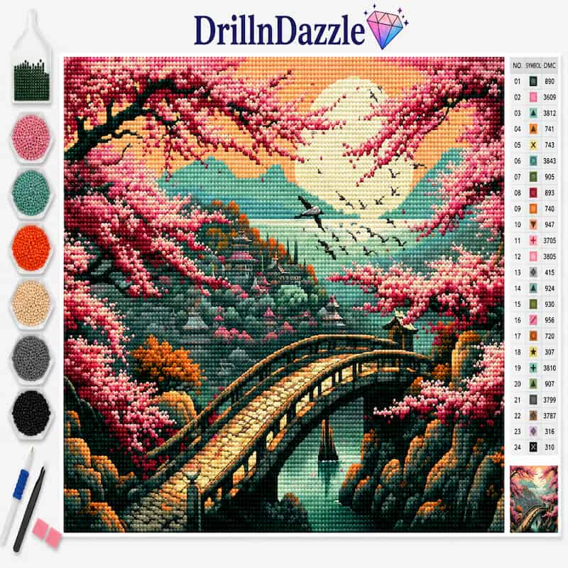 A diamond painting kit by DrillnDazzle featuring a scenic landscape design of a stone bridge over water surrounded by pink cherry blossoms, mountains, and a large moon. The image includes a color chart on the right, a row of paint pots and tools on the left, and the DrillnDazzle brand logo at the top.