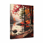 A vertical canvas wall art print depicting an autumn lakeside forest scene with red, orange, and yellow foliage, dark tree trunks, rocks, and reflections in the water, shown at a slight angle on a white background.