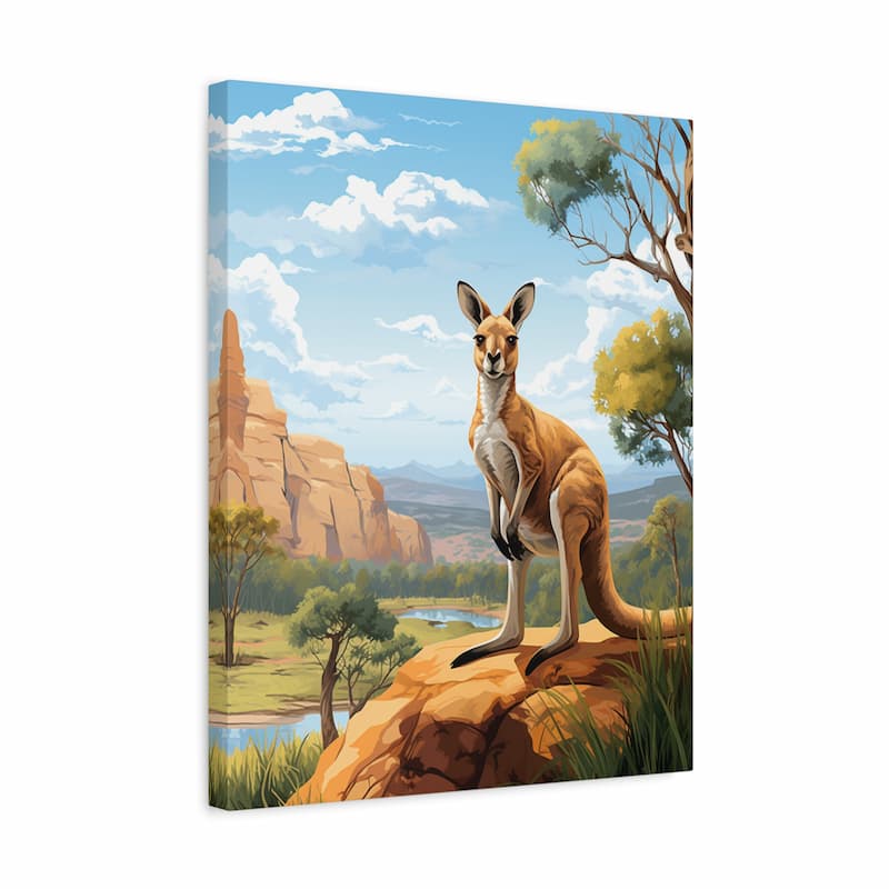 A vertical canvas wall art print depicting a kangaroo standing on a rocky outcrop in a scenic landscape with trees, a river, and blue sky. The canvas is shown at a slight angle against a plain white background.