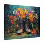 A square canvas wall art print showing a pair of dark brown lace-up boots surrounded by a colorful bouquet of orange, yellow, pink, and purple flowers against a dark teal and black painted background.