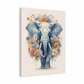 A vertical canvas wall art print featuring a stylized blue elephant surrounded by colorful watercolor flowers in orange, yellow, and pink on a light cream background.