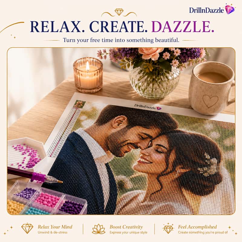 A diamond painting kit showing a printed couple portrait with colorful beads, a paint pen, and compartments of beads, styled on a wooden table with a candle, flowers, and a mug. The image has promotional text at the top and bottom, including the brand name DrillnDazzle.